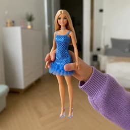 Ella — her Barbie doll and brave practice companion